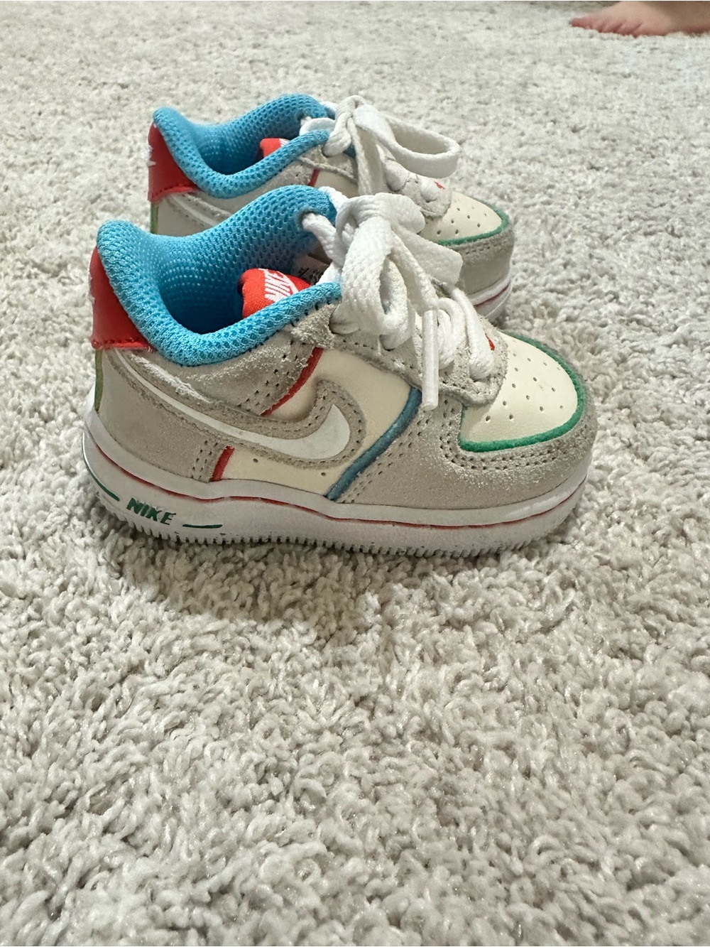 Nike Air Force 1 LV 8 Kids White Sneakers with Blue Lining and Red Heel